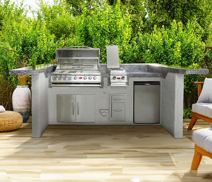 Cal Flame Platinum outdoor kitchen with grill, side burner, refrigerator and preparation space
