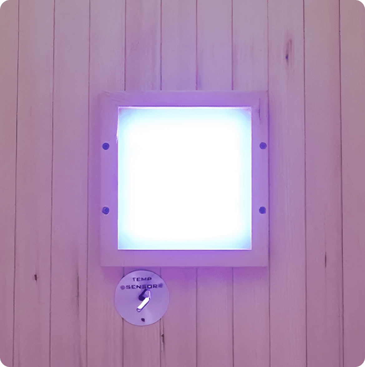 Glowing panel on wooden wall